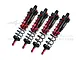 Four GPM Racing red and black aluminium piggyback shock absorbers for RC cars arranged in a row against a white background.