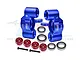 A set of blue anodized aluminium steering hubs for RC cars, including red washers, screws, and ball bearings on a white background.