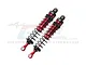 Two GPM Racing red and black aluminium adjustable RC shock absorbers shown on a white background.