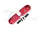 Two red anodized aluminium RC motorcycle foot pegs with black mounting hardware on a white background.