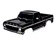 A black Traxxas 1/10 scale 1979 Ford F-150 RC truck body shell, pre-painted with detailed grille, headlights, and trim.