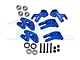 A set of blue anodized aluminium RC car hub carriers and steering knuckles with included bearings, screws, and nuts.