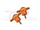 Two orange anodized aluminium spare tyre locks for RC cars, featuring the GPM logo engraved on the top surface.