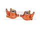 Two orange anodized aluminium steering hubs for RC cars, marked L and R with GPM Racing branding and 7075 alloy specification.