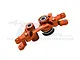 An orange anodized aluminium steering bell crank assembly for an RC car, featuring integrated ball bearings and GPM branding.