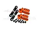 GPM Racing orange aluminium 25T servo horns and black steering linkages with mounting screws on a white background.
