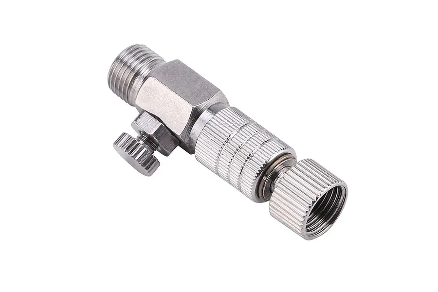 A silver-coloured metal airbrush quick release coupling with an integrated air adjustment valve.