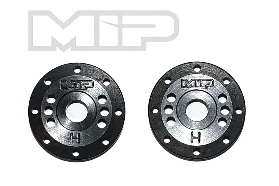 Two black circular MIP shock pistons with multiple holes, featuring the MIP logo and an H marking, set against a white background.