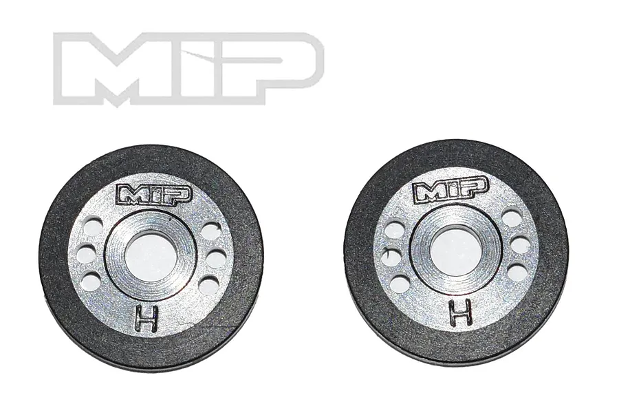 Two MIP Bypass1 shock pistons featuring a silver center with the letter H and a black outer ring, displayed against a white background.