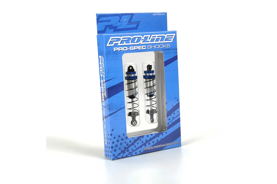 Two Pro-Line Pro-Spec assembled RC shock absorbers inside their blue and white retail packaging box.