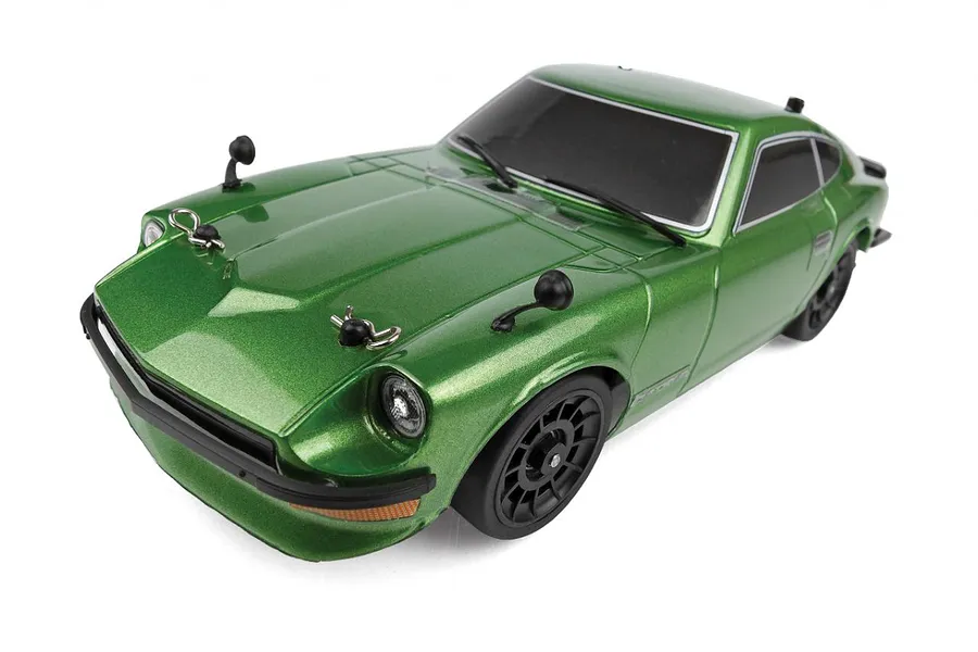 A high-angle studio shot of a green Team Associated SR27 Datsun 240Z RC car on a white background.
