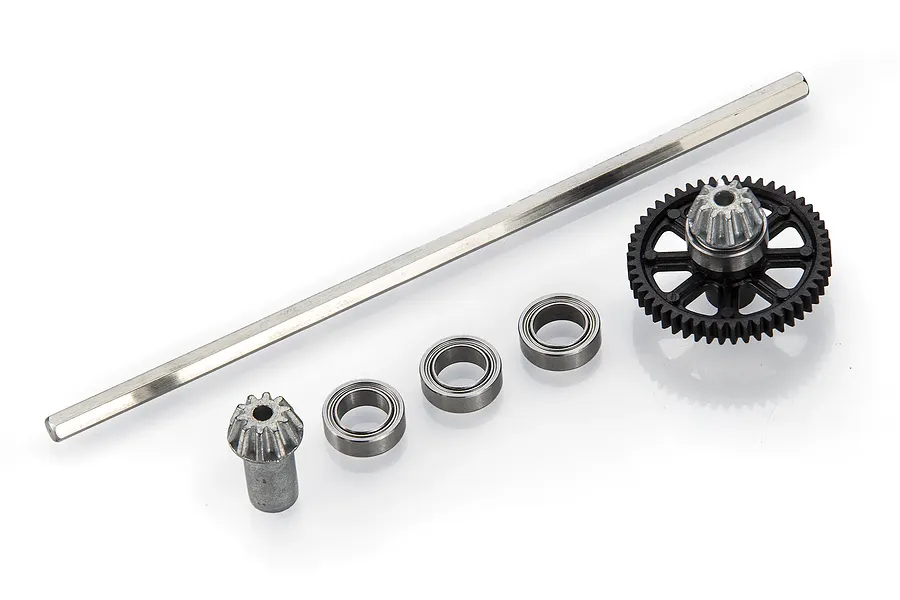 Xinlehong centre drivetrain set including a long metal driveshaft, a small metal pinion gear, three ball bearings, and a larger black plastic spur gear.
