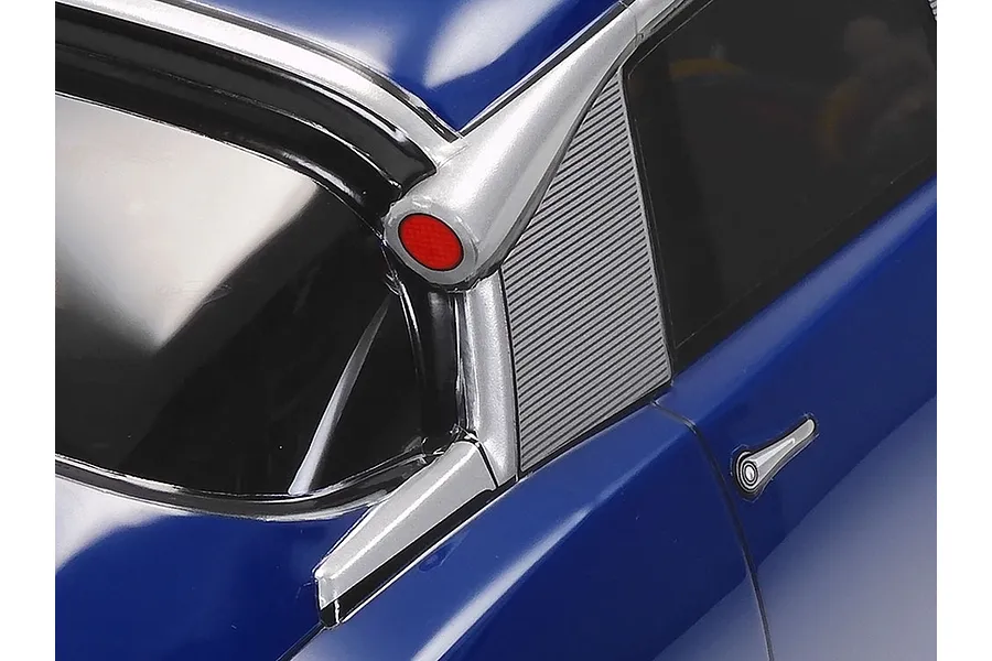 Close-up of the rear C-pillar and roof-mounted indicator light on a blue Tamiya Citroen DS RC car body.
