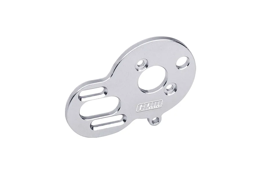 A silver GPM Racing aluminium motor plate for RC cars, featuring multiple mounting holes and slots, isolated on a white background.