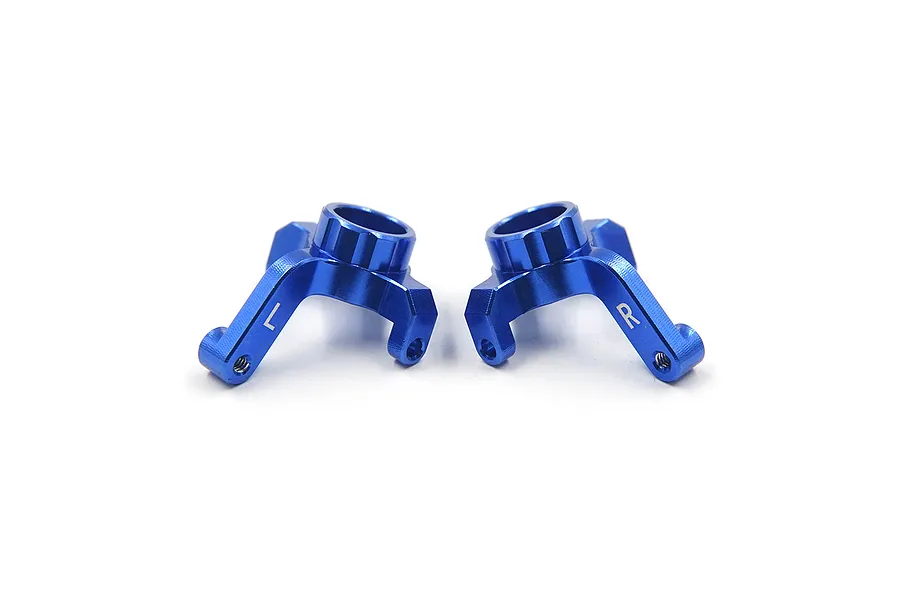 A pair of dark blue anodized aluminium RC steering hubs marked with L and R for left and right sides.