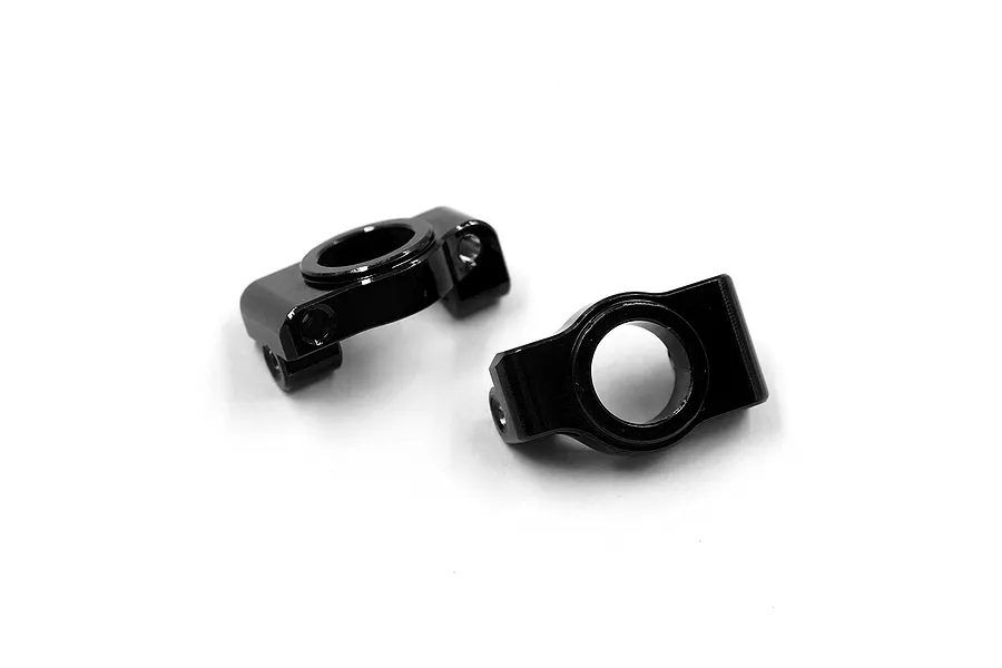 Two black aluminium front hub carriers for RC cars, shown from a top-down angle against a white background.