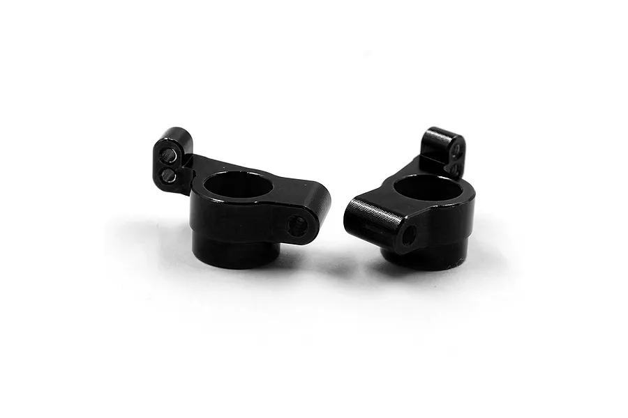 A pair of black anodized aluminium rear hubs for RC cars, shown against a plain white background.