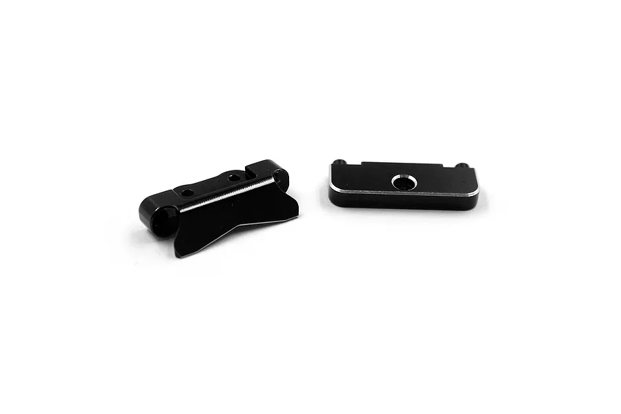 Two black anodized aluminium RC suspension mounts on a white background.