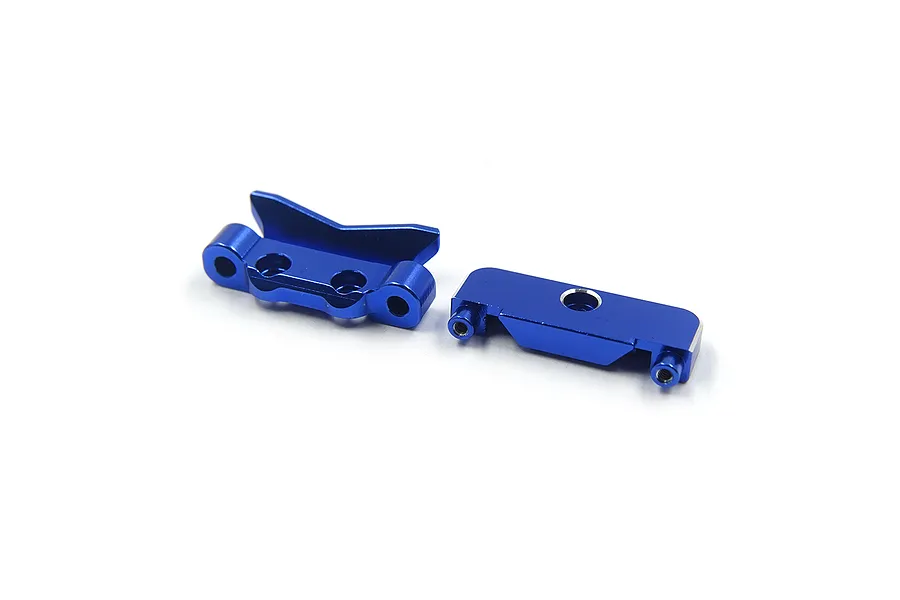 Two dark blue anodized aluminium RC suspension mounts on a white background.
