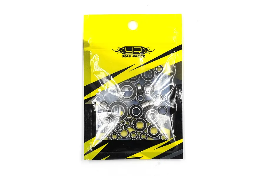 A sealed plastic bag containing a complete set of metal ball bearings for an RC car, branded with the Yeah Racing logo on a yellow and black background.