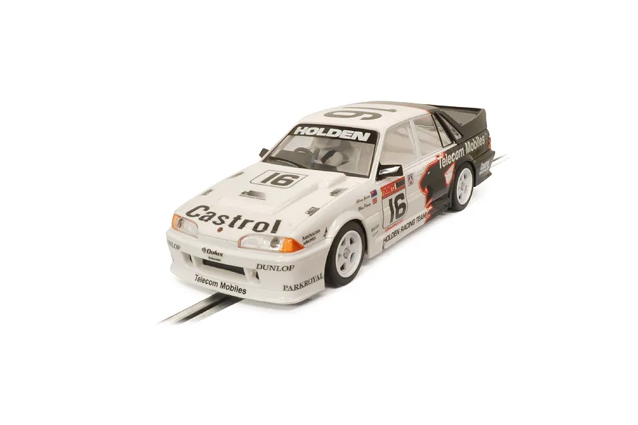 A 1/32 scale Scalextric slot car model of the 1990 Holden VL Commodore Group A race car, featuring Castrol and Telecom Mobiles livery, number 16.