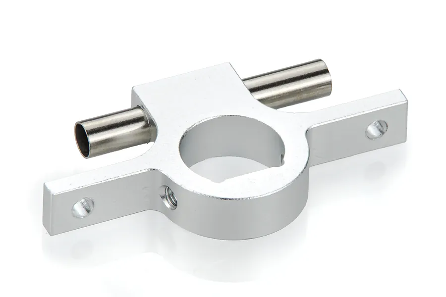 A silver UDI aluminium motor mount for an RC boat, featuring a central circular housing with two side mounting arms and two cylindrical metal pins.