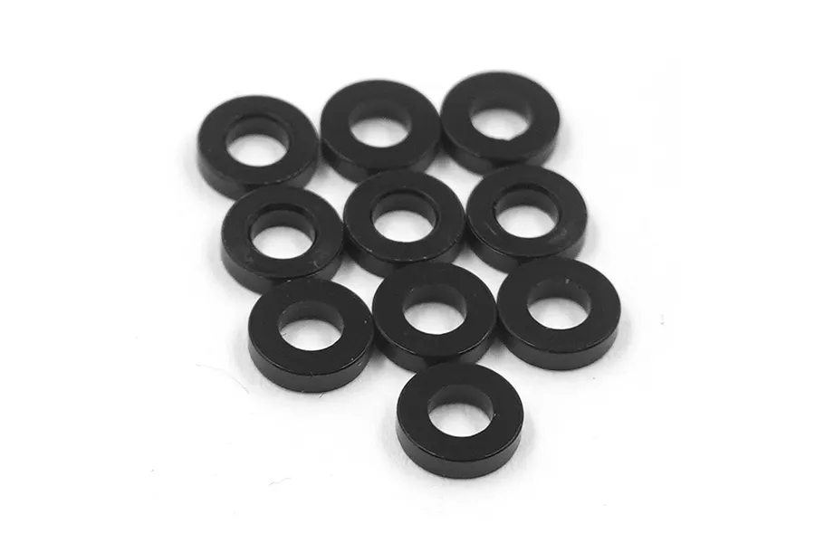 A collection of ten small, black circular aluminium washers arranged on a plain white background.