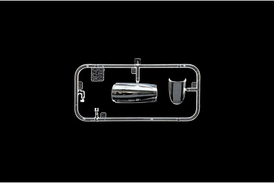 A clear plastic sprue containing a cockpit canopy and another aircraft part for a 1/72 scale model kit.