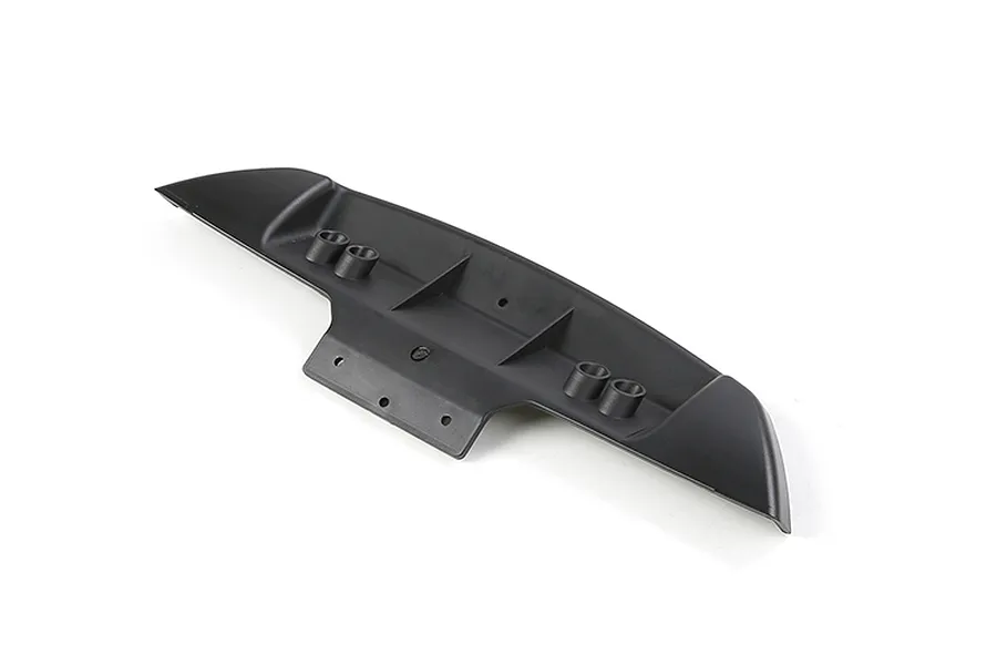 A black plastic rear bumper for an RC car, viewed from an angled perspective against a white background.