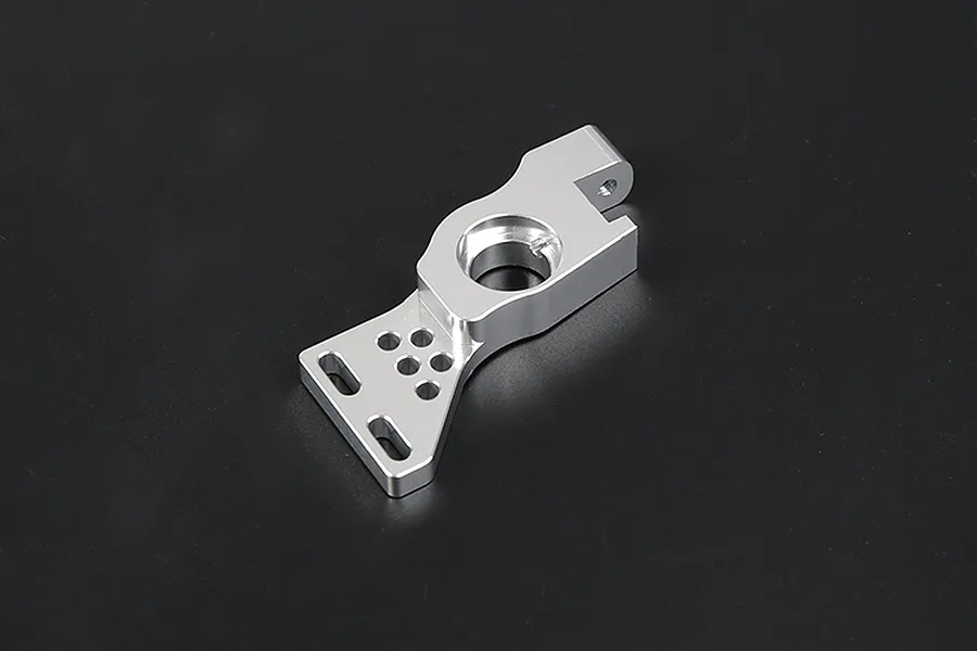 A silver Rovan aluminium first stage small gear mount for RC cars, shown from an angled top-down perspective on a black background.