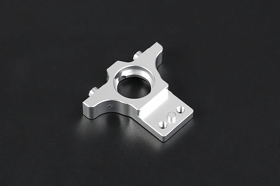 A silver Rovan aluminium first stage large gear mount for RC vehicles, shown from an angled top-down perspective against a dark background.