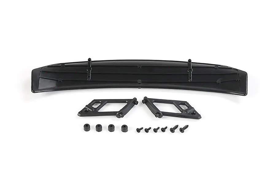 A black RC car rear wing with two mounting brackets, four small rubber grommets, and six screws arranged on a white background.