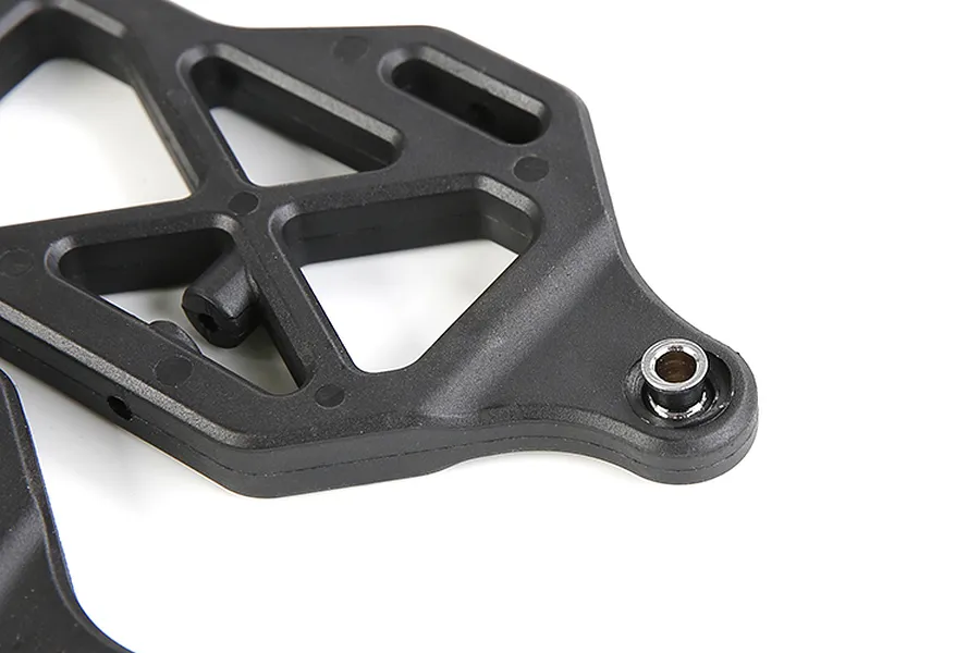 Close-up of a black plastic RC front lower suspension arm with a metal pivot ball insert, set against a white background.