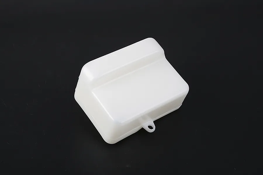 A white plastic RC fuel tank for Rovan models, shown from an elevated angle against a black background.