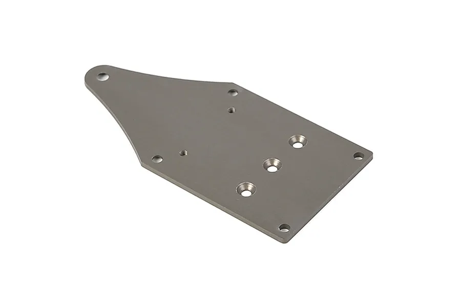 A gunmetal grey aluminium front chassis plate for an RC vehicle, featuring multiple mounting holes and a tapered design.