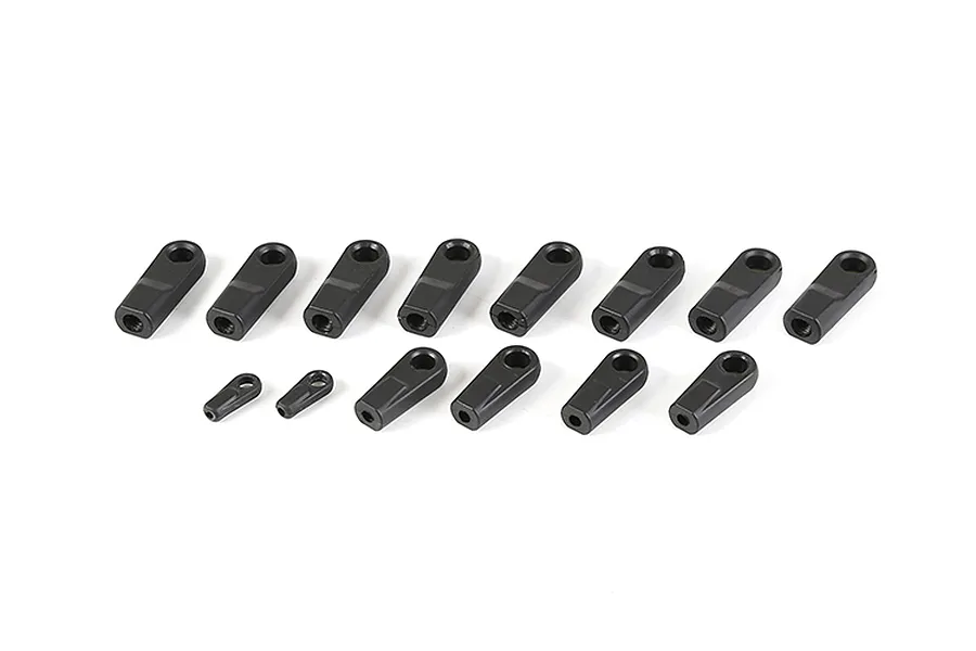 A set of black plastic RC rod ends of various sizes arranged on a white background.
