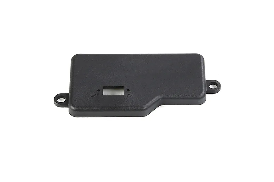 A black plastic Rovan receiver box cover with mounting tabs and a central switch cutout.