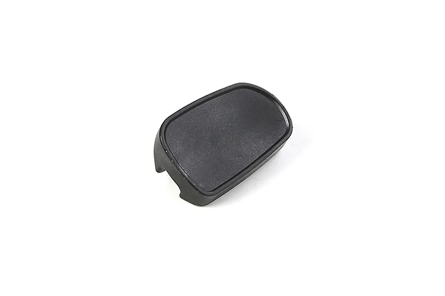 A black plastic side mirror component for an RC vehicle, shown from a top-down angle against a white background.