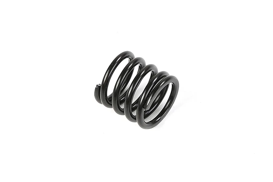 A single black metal coil spring for an RC car servo saver, shown against a plain white background.