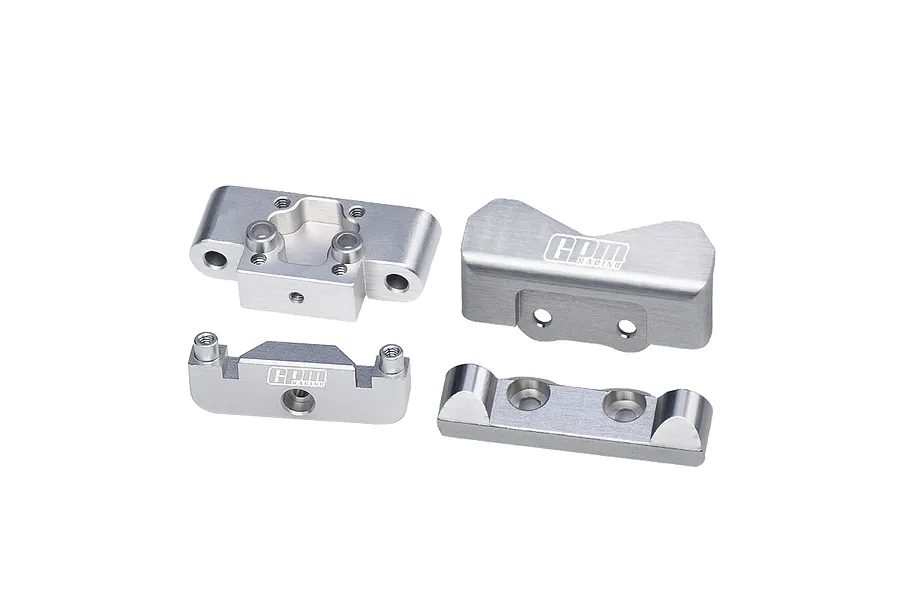 Four silver aluminium RC car parts including a bulkhead and suspension pin mounts from GPM Racing.
