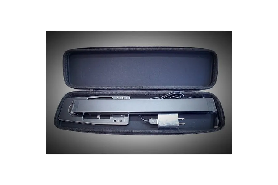 Team Powers LED Pit Light Pro folded inside its black zippered carrying case with a power adapter and cable.