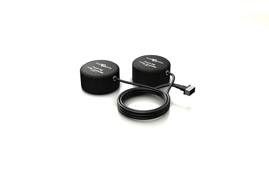 Two black Team Powers Pro-Driver tyre warmers connected by a black cable with a plug, isolated on a white background.