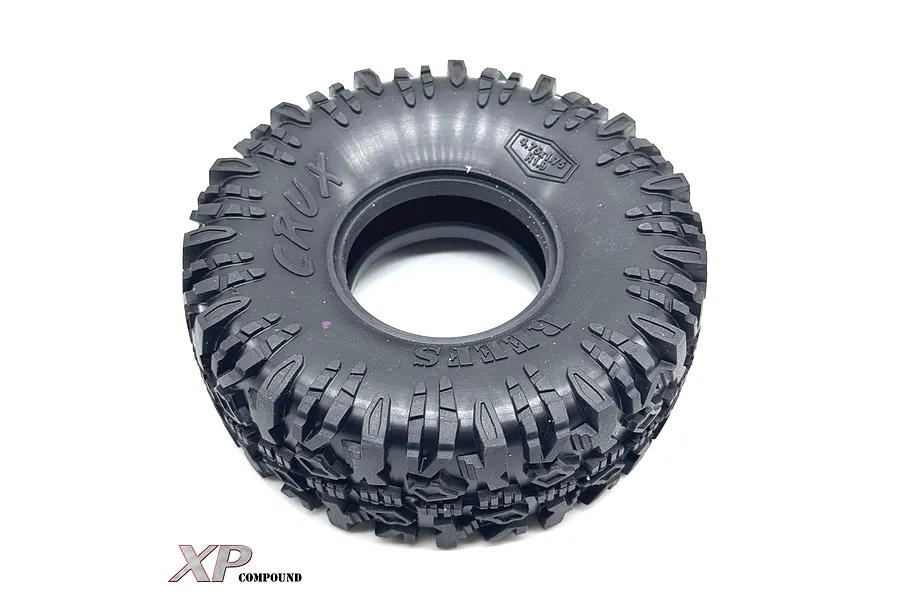 A single black 1.9 inch Reefs RC Crux crawler tyre with aggressive tread pattern, shown against a white background.