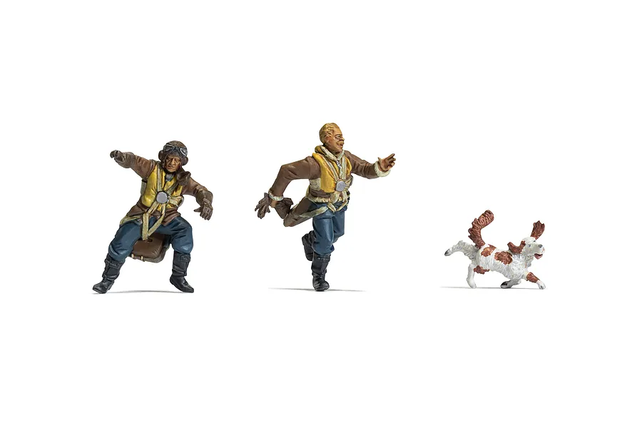 Two painted 1/48 scale RAF pilot figures in flight gear running alongside a small dog on a white background.
