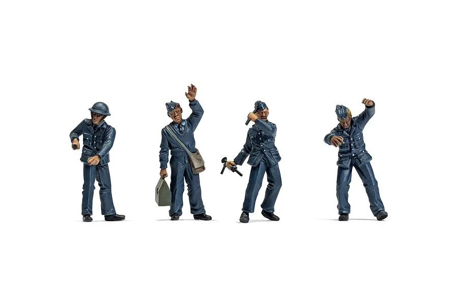 Four painted 1/48 scale RAF ground crew figures in blue uniforms standing in various poses against a white background.