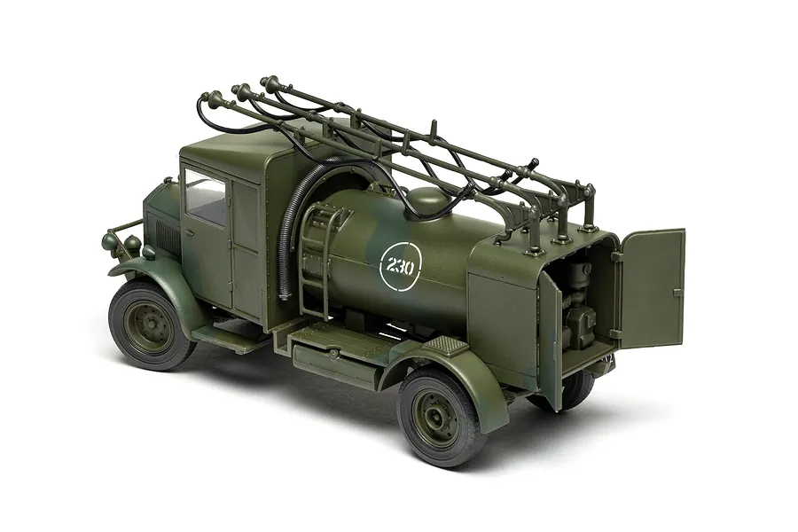A 1/48 scale plastic model of an Albion 3-Point Fueller truck painted in military green camouflage with the number 230 on the side.
