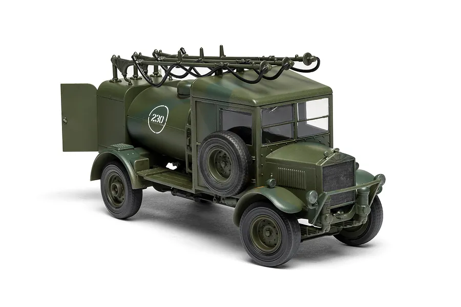 A 1/48 scale plastic model kit of an Albion 3-Point Fueller truck painted in military green camouflage with the number 230 on the fuel tank.