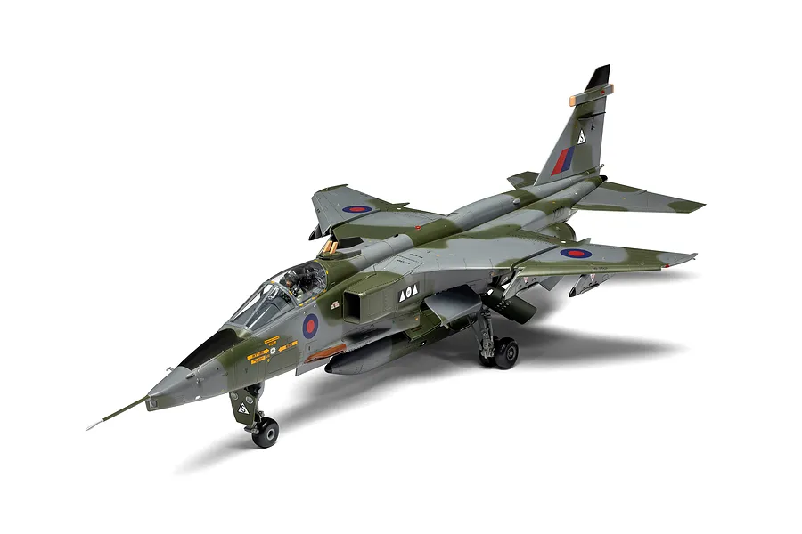 A fully assembled and painted 1/48 scale model of a SEPECAT Jaguar GR.1 fighter jet, featuring a camouflage paint scheme and Royal Air Force markings.