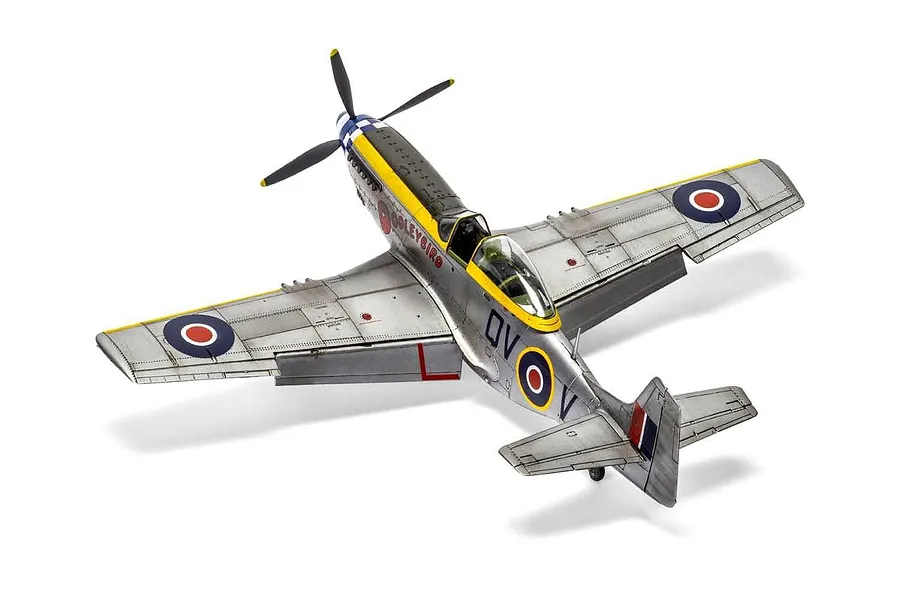 A completed 1/48 scale plastic model of a North American Mustang Mk.IV fighter aircraft, painted in silver with RAF markings and yellow accents.