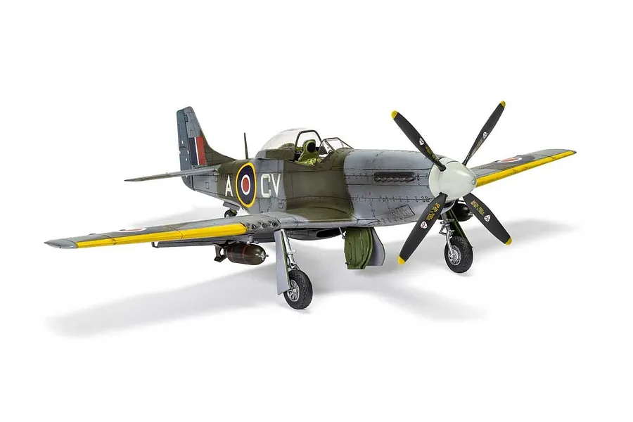 A fully assembled and painted 1/48 scale model of a North American Mustang Mk.IV fighter aircraft, featuring camouflage paint and RAF markings.
